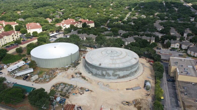 An aerial view of the construction of a large water tank.